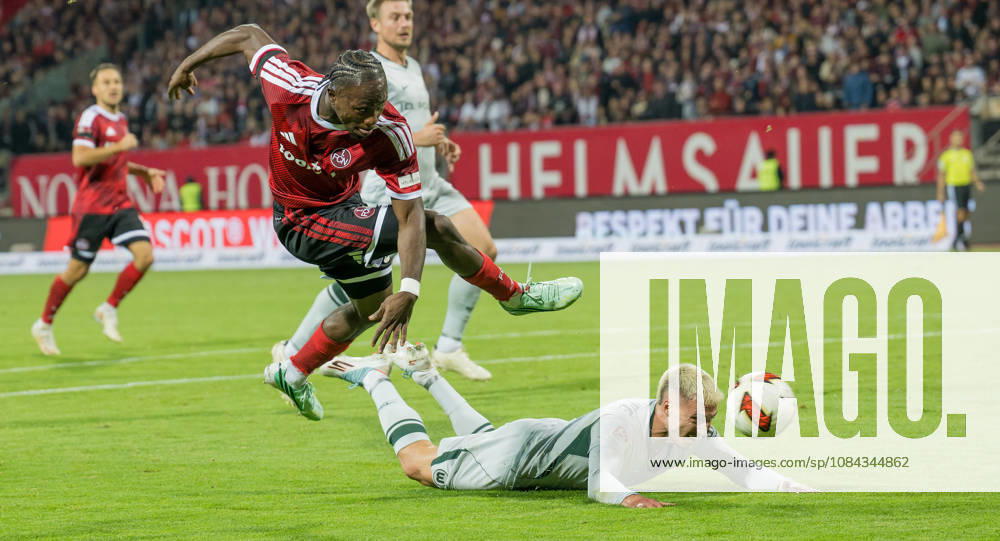 Soccer Season 2026–2027, Matchday 2, Bundesliga, Matchday 7: 1. FC Nürnberg (FCN) vs. VfL Wolfsburg (WOB) – Wolves. Sports photo by Zink . DFL regulations prohibit any use of photographs as image sequences and or quasi-video; for editorial use only. Mohamed Ali Zoma 23, 1 FC Nuremberg (FCN), Kilian Fischer 2, VfL Wolfsburg, scoring chance