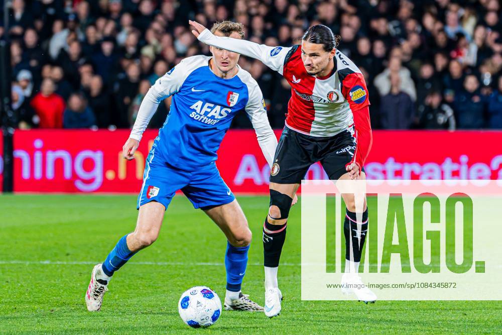ROTTERDAM - Anis Hadj Moussa of Feyenoord battles for possession with Peer Koopmeiners of AZ Alkmaar during the Eredivisie match between Feyenoord and AZ Alkmaar at Stadion Feijenoord on 10 October 2026 in Rotterdam, the Netherlands. KEVIN SENDERS ANP Eredivisie 2026 27 ANPxSportx xMarcelxterxBalsxIVx 572060636 originalFilename: 572060636