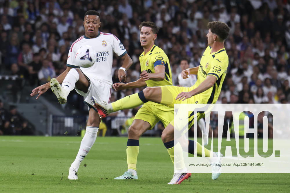 Real Madrid vs. Villarreal, La Liga EA Sports 2026, October 10, 2026, Santiago Bernabéu Stadium, Madrid, Spain Kylian Mbappé of Real Madrid is defended by Pau Navarro and Juan Foyth of Villarreal during a La Liga EA Sports match between Real Madrid and Villarreal at Santiago Bernabéu Stadium on October 10, 2026, in Madrid, Spain Madrid Santiago Bernabéu Stadium Madrid Spain