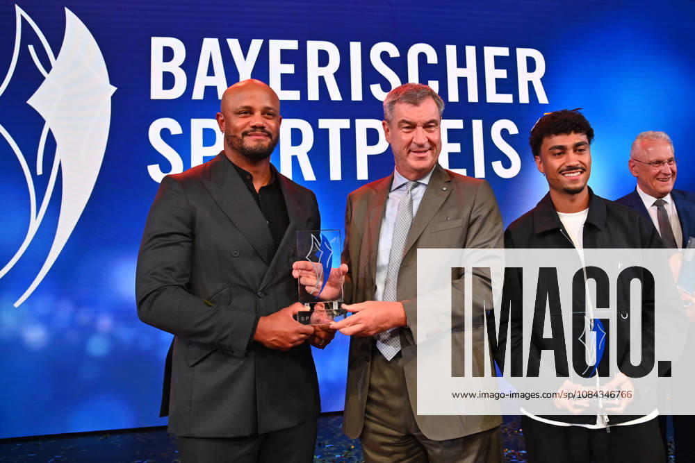 Coach Vincent KOMPANY of Bayern Munich with the Honorary Award from Bavarian Minister-President Markus SOEDER, Nathaniel BROWN of Bayern Munich, and Joachim HERRMANN, Bavarian Minister of the Interior, at the 2026 Bavarian Sports Award ceremony at BMW Welt, Red Carpet on October 10, 2026