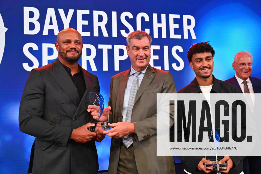 Coach Vincent KOMPANY of Bayern Munich with the Honorary Award from Bavarian Minister-President Markus SOEDER, Nathaniel BROWN of Bayern Munich, and Joachim HERRMANN, Bavarian Minister of the Interior, at the 2026 Bavarian Sports Award ceremony at BMW Welt, Red Carpet on October 10, 2026
