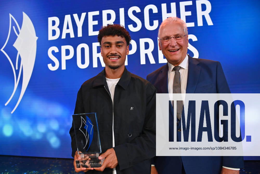 Nathaniel BROWN of Bayern Munich receives his award from Joachim HERRMANN, Bavarian Minister of the Interior, at the 2026 Bavarian Sports Awards at BMW Welt, Red Carpet, on October 10, 2026
