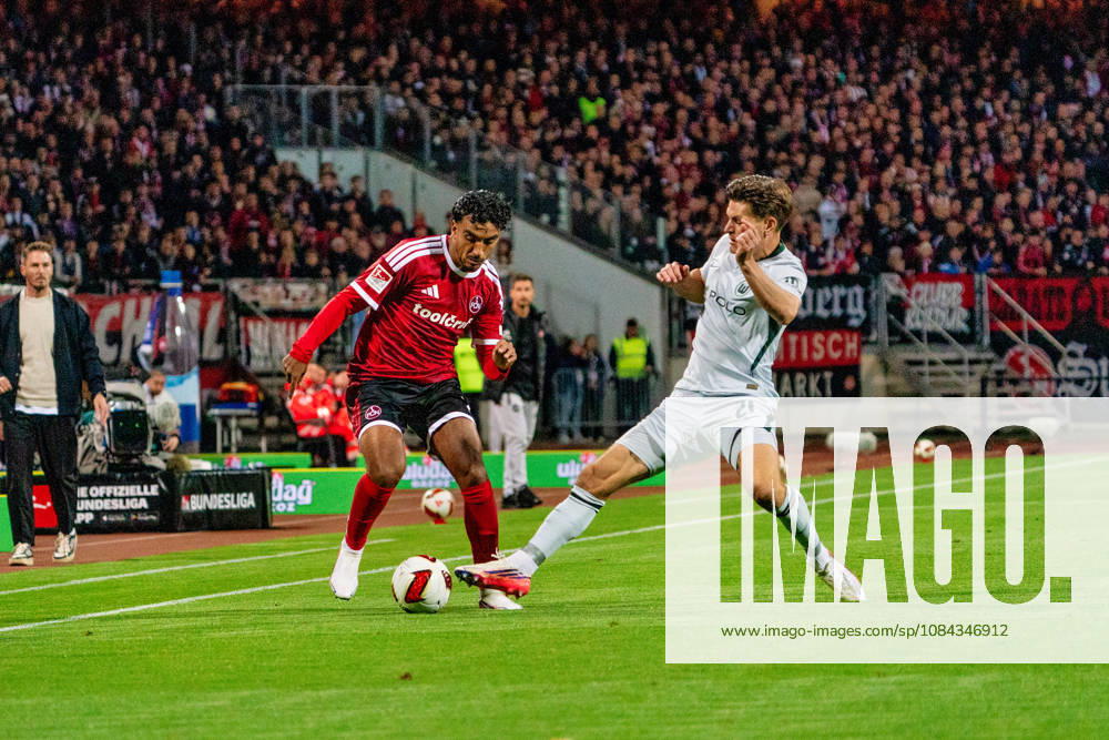 Rayan Ghrieb, 1. FC Nuremberg, 7, and Joakim Maehle, VfL Wolfsburg, 21, GER, 1. FC Nuremberg vs. VfL Wolfsburg, soccer, 2. Bundesliga, Matchday 7, 2026–2027 season, October 10, 2026, DFL regulations prohibit any use of photographs as image sequences and or quasi-video, GER, 1. FC Nuremberg vs. VfL Wolfsburg, Soccer, 2. Bundesliga, Matchday 7, 2026–2027 Season, October 10, 2026, Nuremberg