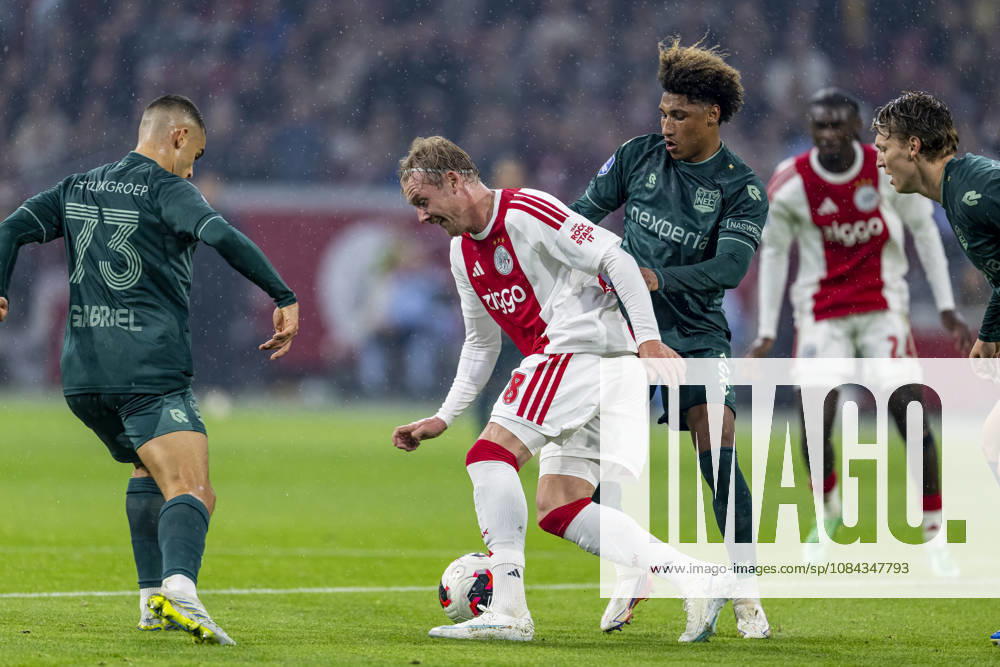 AMSTERDAM l AFC Ajax Amsterdam forward Julian Brandt and NEC Nijmegen midfielder Noe Lebreton during the Vriendenloterij Eredivisie match between Ajax and NEC at the Johan Cruijff ArenA on October 10, 2026, in Amsterdam, Netherlands. Photo by DeFodi Images
