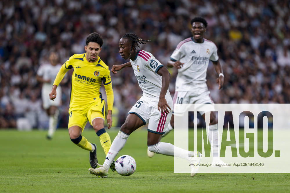 Real Madrid CF v Villarreal CF - LaLiga EA Sports 2026 27 Yan Diomande of Real Madrid CF (C) is in action with the ball defended by Ilias Akhomach of Villarreal CF (L) during the LaLiga EA Sports football match between Real Madrid CF and Villarreal CF at Estadio Bernabeu on October 10, 2026 in Madrid, Spain. Madrid Estadio Bernabeu Madrid Spain