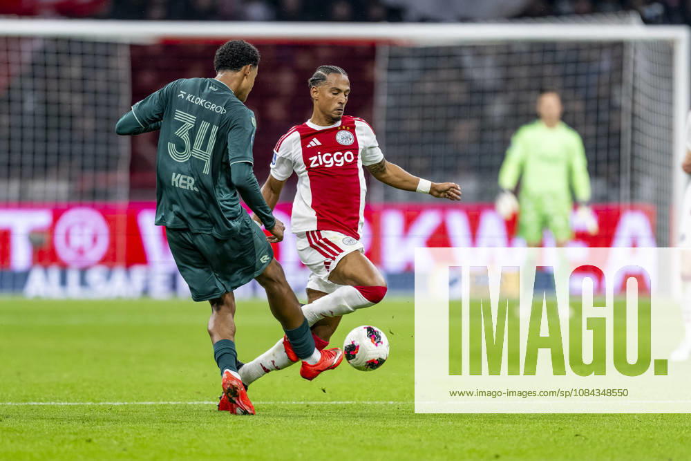 AMSTERDAM l NEC Nijmegen defender Kevin Kers and AFC Ajax Amsterdam midfielder Thilo Kehrer during the Vriendenloterij Eredivisie match between Ajax and NEC at the Johan Cruijff ArenA on October 10, 2026, in Amsterdam, the Netherlands. Photo by DeFodi Images