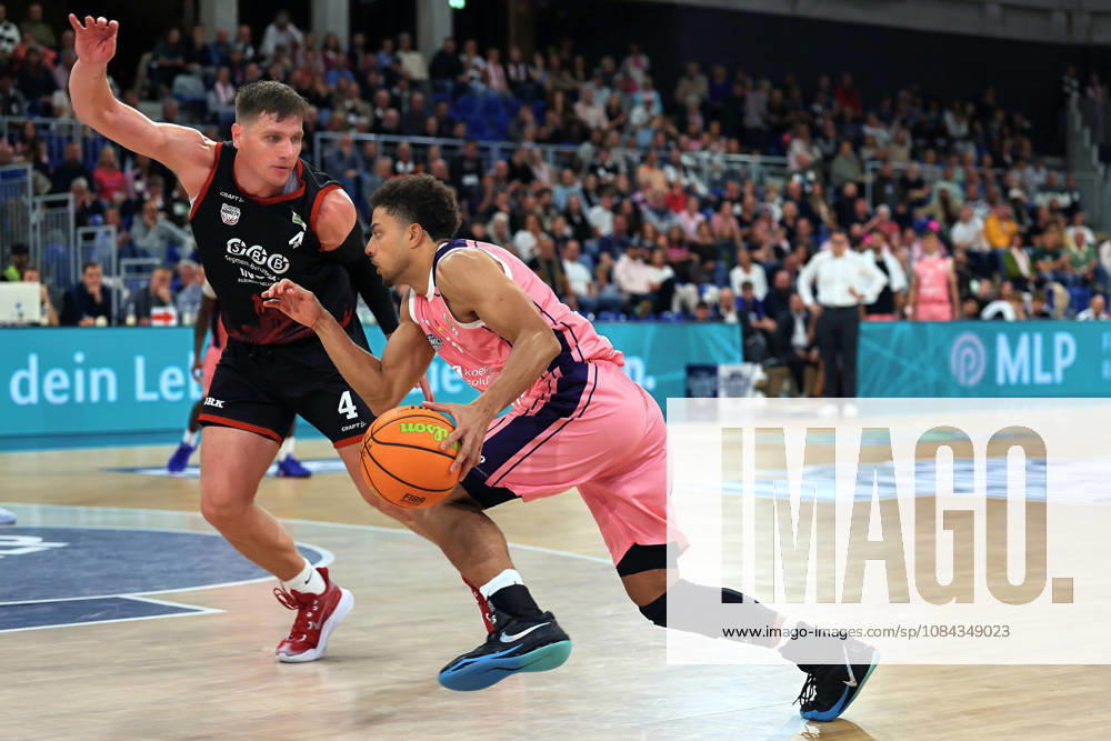 From left in a one-on-one matchup: Brock Gardner (SBB Baskets Wolmirstedt), 4, Kevin McClain (MLP Academics Heidelberg), 03 GER BBL MLP Academics Heidelberg SBB Baskets Wolmirstedt Basketball Barmer 2 Basketball Bundesliga ProA Matchday 4, 2026–2027 season, October 10, 2026 GER MLP Academics Heidelberg SBB Baskets Wolmirstedt, Basketball Barmer 2 Basketball Bundesliga ProA Matchday 4, 2026–2027 season, October 10, 2026, Heidelberg