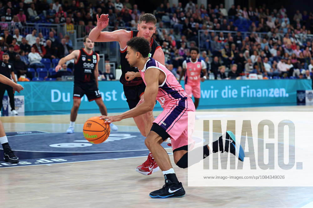 From left in a one-on-one matchup: Brock Gardner (SBB Baskets Wolmirstedt), 4, Kevin McClain (MLP Academics Heidelberg), 03 GER BBL MLP Academics Heidelberg SBB Baskets Wolmirstedt Basketball Barmer 2 Basketball Bundesliga ProA Matchday 4, 2026–2027 season, October 10, 2026 GER MLP Academics Heidelberg SBB Baskets Wolmirstedt, Basketball Barmer 2 Basketball Bundesliga ProA Matchday 4, 2026–2027 season, October 10, 2026, Heidelberg