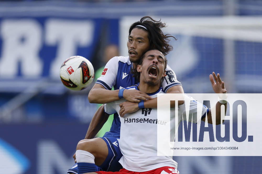 From left to right: Koki Machida of TSG Hoffenheim and Yussuf Poulsen of HSV, in the Bundesliga match between TSG 1899 Hoffenheim and Hamburger SV at the PreZero Arena, Sinsheim, Germany, on October 10, 2026, in action during the Bundesliga match between TSG 1899 Hoffenheim and Hamburger SV at the PreZero Arena, Sinsheim, Germany, on October 10, 2026. DFB and DFL regulations prohibit any use of photographs as image sequences and or quasi-video,