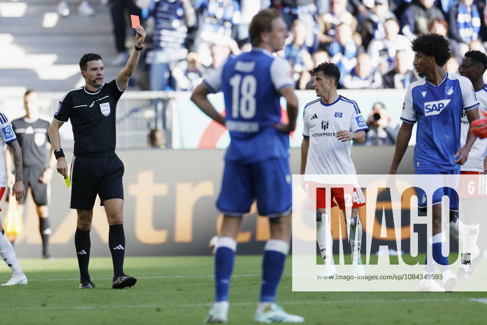 Referee Harm Osmers shows Bernardo of TSG Hoffenheim a yellow-red card—red card, ejection, two-yellow-card dismissal—during the Bundesliga match between TSG 1899 Hoffenheim and Hamburger SV at the PreZero Arena, Sinsheim, Germany, on October 10, 2026, in action during the Bundesliga match between TSG 1899 Hoffenheim and Hamburger SV at the PreZero Arena, Sinsheim, Germany, on October 10, 2026. DFB and DFL regulations prohibit any use of photographs as image sequences and or quasi-video,