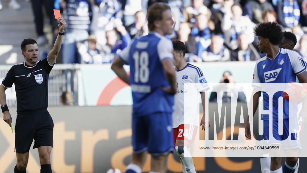 Referee Harm Osmers shows Bernardo of TSG Hoffenheim a yellow-red card—red card, ejection, two-yellow-card dismissal—during the Bundesliga match between TSG 1899 Hoffenheim and Hamburger SV at the PreZero Arena, Sinsheim, Germany, on October 10, 2026, in action during the Bundesliga match between TSG 1899 Hoffenheim and Hamburger SV at the PreZero Arena, Sinsheim, Germany, on October 10, 2026. DFB and DFL regulations prohibit any use of photographs as image sequences and or quasi-video,