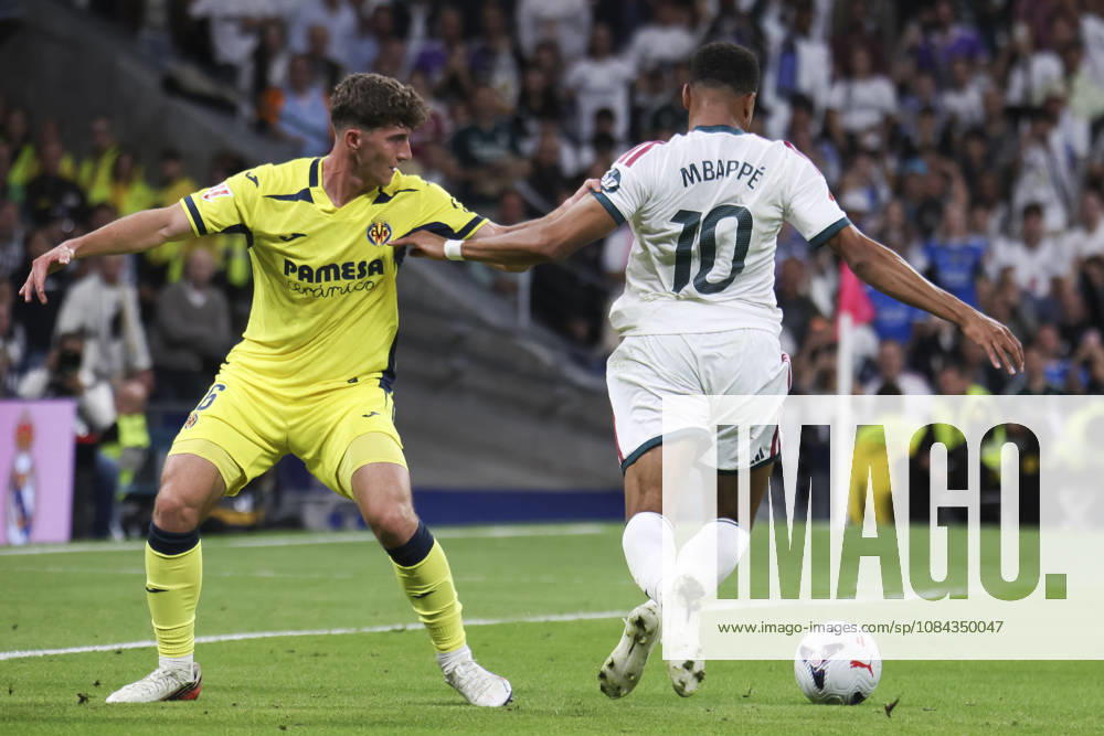 Real Madrid vs. Villarreal, La Liga EA Sports 2026, October 10, 2026, Santiago Bernabéu Stadium, Madrid, Spain Kylian Mbappé of Real Madrid is defended by Pau Navarro during a La Liga EA Sports match between Real Madrid and Villarreal at Santiago Bernabéu Stadium on October 10, 2026, in Madrid, Spain Madrid Santiago Bernabéu Stadium Madrid Spain