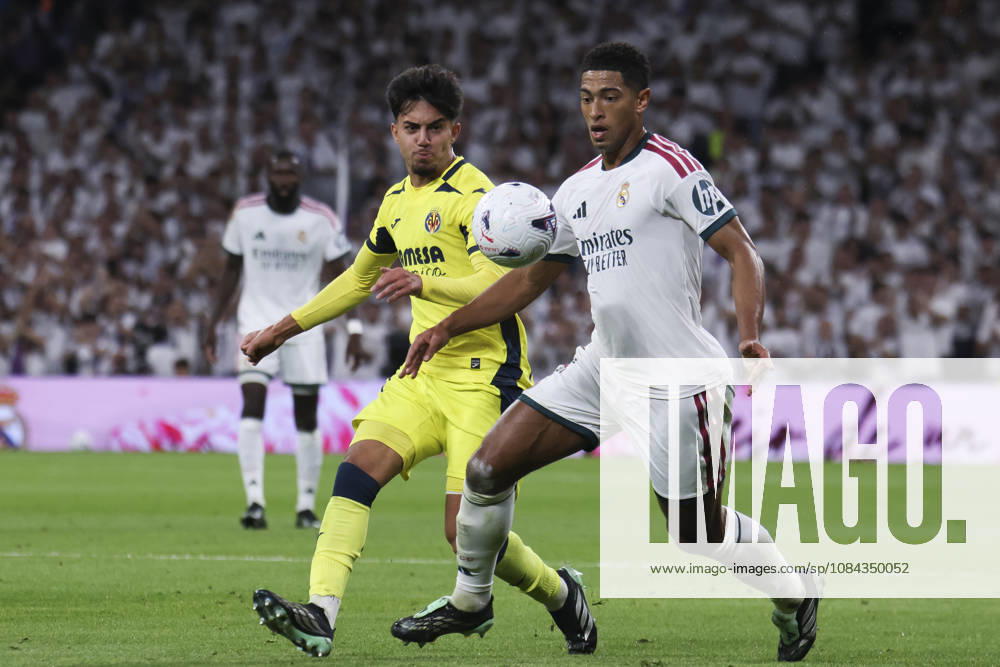 Real Madrid vs. Villarreal, La Liga EA Sports 2026, October 10, 2026, Santiago Bernabéu Stadium, Madrid, Spain Jude Bellingham of Real Madrid battles for the ball against Ilias Akhomach of Villarreal during the La Liga EA Sports match between Real Madrid and Villarreal at Santiago Bernabéu Stadium on October 10, 2026, in Madrid, Spain Madrid Santiago Bernabéu Stadium Madrid Spain