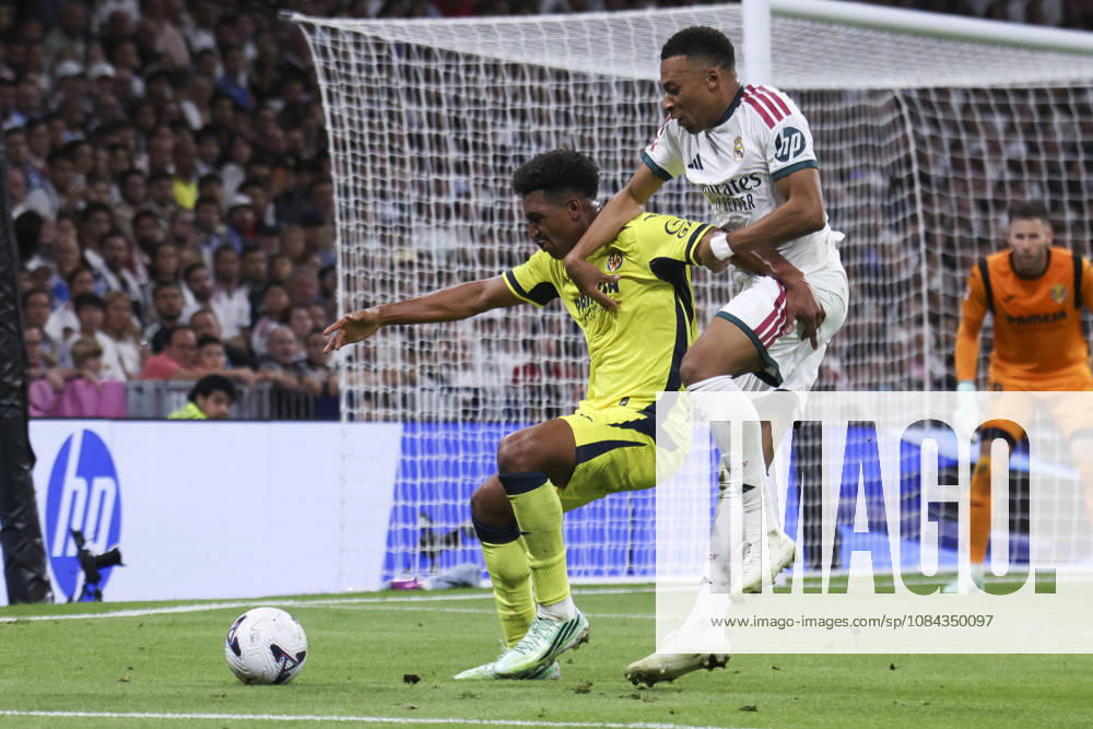Real Madrid vs. Villarreal, La Liga EA Sports 2026, October 10, 2026, Santiago Bernabéu Stadium, Madrid, Spain Kylian Mbappé of Real Madrid battles for the ball against Alex Freeman during the La Liga EA Sports match between Real Madrid and Villarreal at Santiago Bernabéu Stadium on October 10, 2026, in Madrid, Spain Madrid Santiago Bernabéu Stadium Madrid Spain