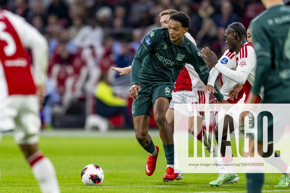 AMSTERDAM l NEC Nijmegen defender Kevin Kers and AFC Ajax Amsterdam defender Jorthy Mokio during the Vriendenloterij Eredivisie match between Ajax and NEC at the Johan Cruijff ArenA on October 10, 2026, in Amsterdam, Netherlands. Photo by DeFodi Images