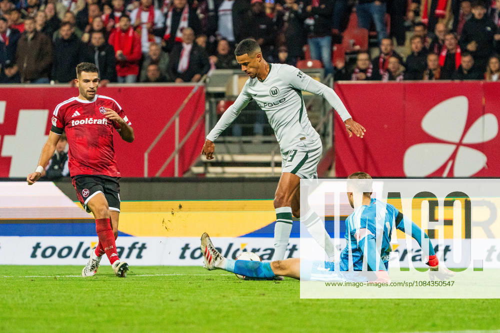 Robert Glatzel, VfL Wolfsburg, 19, and Jan Reichert, 1. FC Nuremberg, 01, GER, 1. FC Nuremberg vs. VfL Wolfsburg, Soccer, 2. Bundesliga, Matchday 7, 2026–2027 Season, October 10, 2026, DFL regulations prohibit any use of photographs as image sequences and or quasi-video, GER, 1 FC Nuremberg vs. VfL Wolfsburg, Soccer, 2. Bundesliga, Matchday 7, 2026–2027 Season, October 10, 2026, Nuremberg