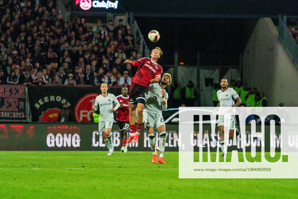 Eric Porstner, 1 FC Nuremberg, 41, and Muhammed Damar, VfL Wolfsburg, 20, GER, 1 FC Nuremberg vs. VfL Wolfsburg, soccer, 2. Bundesliga, Matchday 7, 2026–2027 season, October 10, 2026, DFL regulations prohibit any use of photographs as image sequences and or quasi-video, GER, 1 FC Nuremberg vs. VfL Wolfsburg, soccer, 2. Bundesliga, Matchday 7, 2026–2027 season, October 10, 2026, Nuremberg
