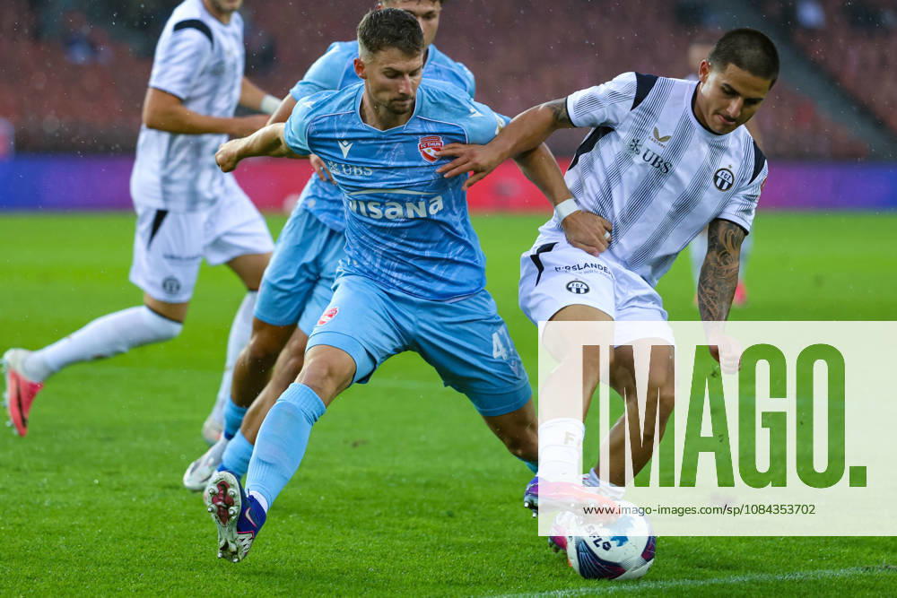 FC Zurich vs. FC Thun, Brack Super League, October 10, 2026. Fabio Fehr (47, FC Thun, left) and z38 in a tackle during the Brack Super League soccer match between FC Zurich and FC Thun on October 10, 2026, Letzigrund Stadium, Zurich, Switzerland Zurich Letzigrund Stadium Zurich Switzerland