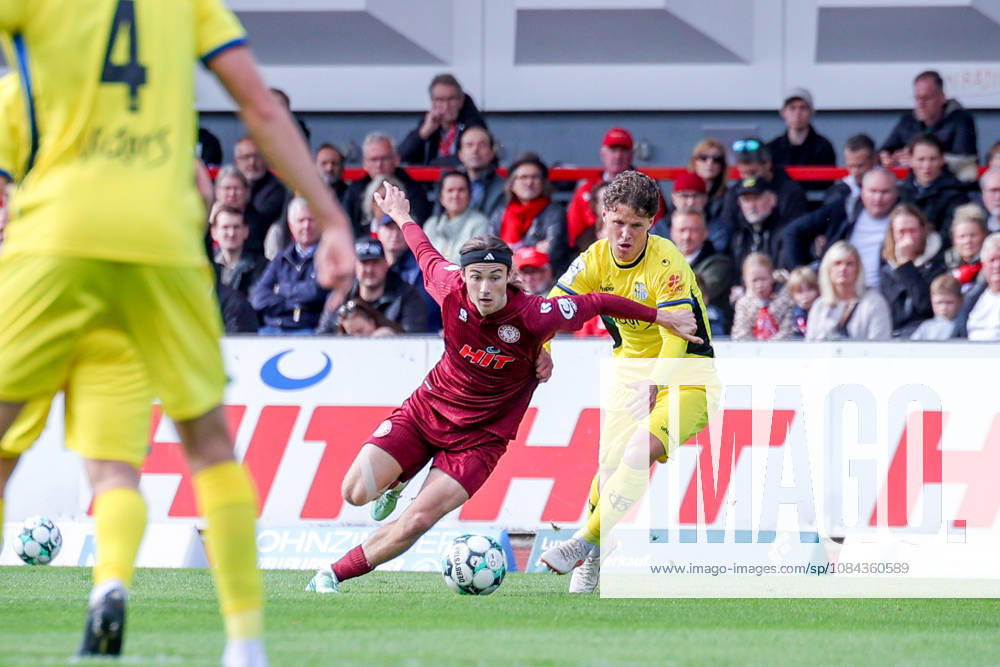 Soccer, SC Fortuna Köln vs. 1 FC Saarbrücken, 3. Liga, Südstation, Matchday 8, 2026–2027 Season: Bennit Bröger (Fortuna Cologne) 38 in a tackle against Daniel Gleiber (1. FC Saarbrücken) 05. DFB regulations prohibit any use of photographs as image sequences and or quasi-video. North Rhine-Westphalia, Germany