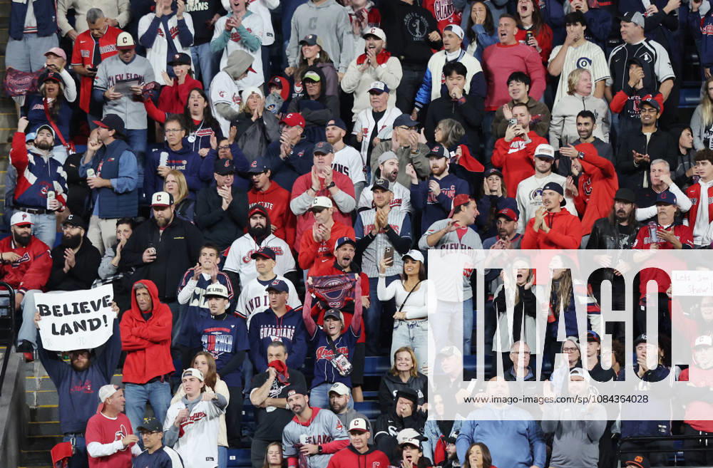 Cleveland Guardians fans cheer for their team as they have the bases loaded against the Chicago White Sox in the eighth inning of an MLB, Baseball Herren, USA American League Division Series at Progressive Field in Cleveland, Ohio, on Saturday, October 10, 2026. CLE20261010738 AARONxJOSEFCZYK