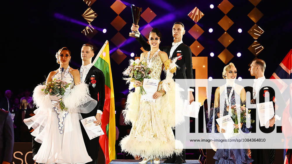 2026 World Standard Dance Championships in Leipzig, WDSF World Championships, October 10, 2026. Winners podium at the World Dance Championships in Leipzig, October 10, 2026. Gold: Vadim Shurin and Anastasia Meshkova from Latvia (center), Silver: Edgaras Baltaragis and Indre Baltarage from Lithuania (left), Bronze: Jonas Alexander Pettersen and Kristy Puusepp from Norway, Leipzig, Saxony, Germany, Leipzig Exhibition Center, Neue Messe Leipzig