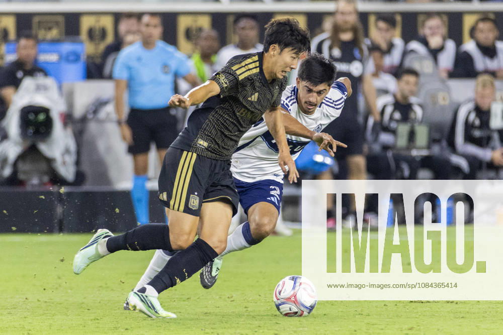 Los Angeles FC attacking midfielder Heung Min Son (7) and Vancouver Whitecaps centre back Mathias Laborda (2) vie for the ball during a MLS, Fussball Herren, USA soccer game on Saturday, Oct. 10, 2026 in Los Angeles. Los Angeles USA - ZUMAc68_ 20261010_zaf_c68_034