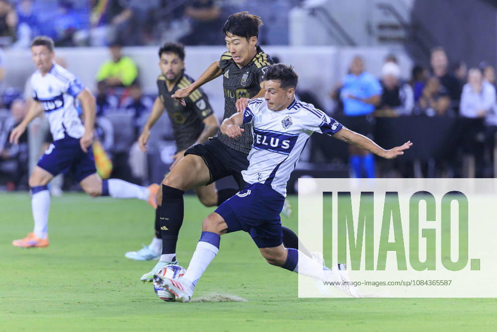 Son Heung-Min 7 of the Los Angeles Football Club and Andres Cubas 20 of the Vancouver Whitecaps struggle for possession of the ball during their regular season MLS, Fussball Herren, USA game on Saturday October 10, 2026 at the BMO Stadium in Los Angeles, California. ARIANA RUIZ PI Los Angeles USA - ZUMAp124 20261010_zaa_p124_008