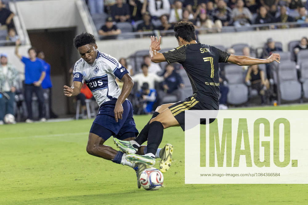 Los Angeles FC attacking midfielder Heung Min Son (7) and Vancouver Whitecaps centre back Ralph Priso (6) vie for the ball during a MLS, Fussball Herren, USA soccer game on Saturday, Oct. 10, 2026 in Los Angeles. Los Angeles USA - ZUMAc68_ 20261010_zaf_c68_042