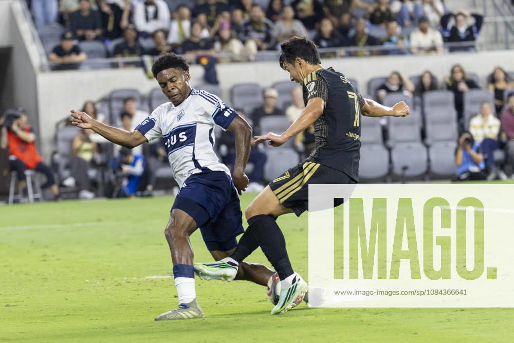 Los Angeles FC attacking midfielder Heung Min Son (7) and Vancouver Whitecaps centre back Ralph Priso (6) vie for the ball during a MLS, Fussball Herren, USA soccer game on Saturday, Oct. 10, 2026 in Los Angeles. Los Angeles USA - ZUMAc68_ 20261010_zaf_c68_046
