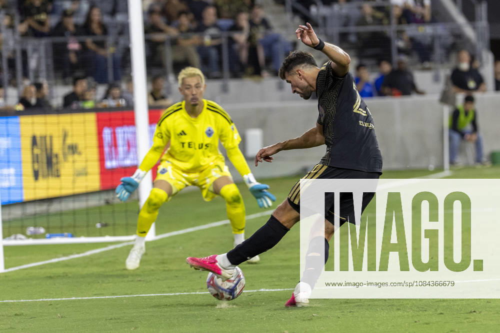 Los Angeles FC left wing back Yevhen Cheberko (23) shoots at Vancouver Whitecaps goalkeeper Yohei Takaoka (1) during a MLS, Fussball Herren, USA soccer game on Saturday, Oct. 10, 2026 in Los Angeles. Los Angeles USA - ZUMAc68_ 20261010_zaf_c68_049