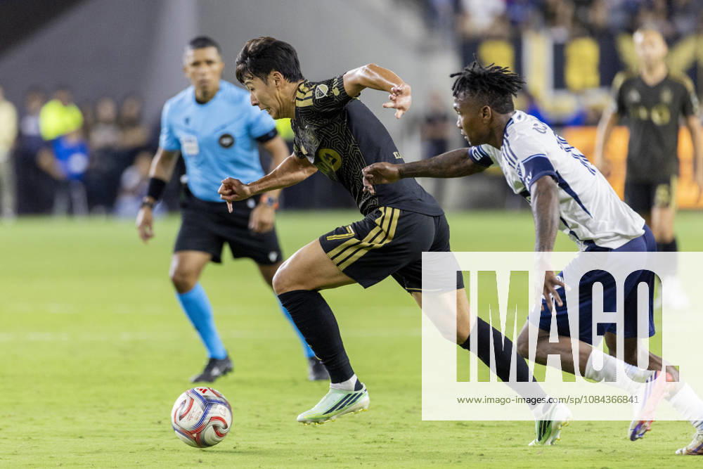Los Angeles FC attacking midfielder Heung Min Son (7) and Vancouver Whitecaps right wing back Edier Ocampo (18) vie for the ball during a MLS, Fussball Herren, USA soccer game on Saturday, Oct. 10, 2026 in Los Angeles. Los Angeles USA - ZUMAc68_ 20261010_zaf_c68_057