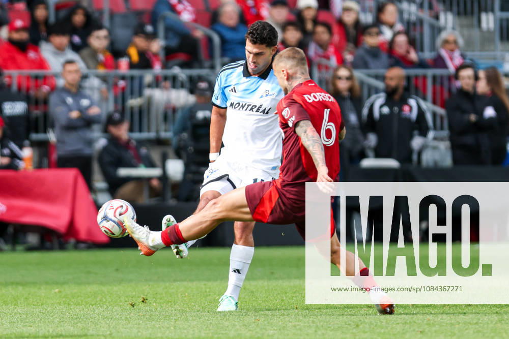 Toronto FC v CF Montreal Daniel Rios 14 of CF Montreal (L) passes the ball during a Major League Soccer game between Toronto FC and CF Montreal at BMO Field in Toronto, Ontario, Canada, on October 10, 2026. Toronto Ontario Canada