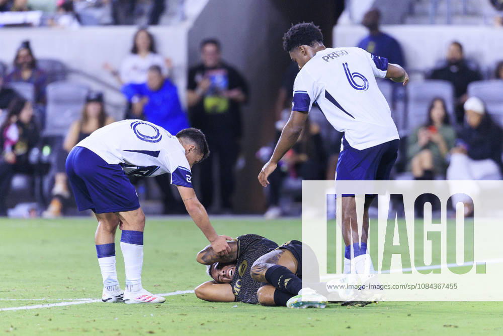 Andres Cubas 20 and Ralph Priso-Mbongue 6 of the Vancouver Whitecaps check on Denis Bouanga 99 of the Los Angeles Football Club after a head collision during their regular season MLS, Fussball Herren, USA game on Saturday October 10, 2026 at the BMO Stadium in Los Angeles, California. LAFC tie with Whitecaps, 1-1. ARIANA RUIZ PI LAFC Vs. Vancouver Whitecaps - ZUMAp124 20261010_zaa_p124_015