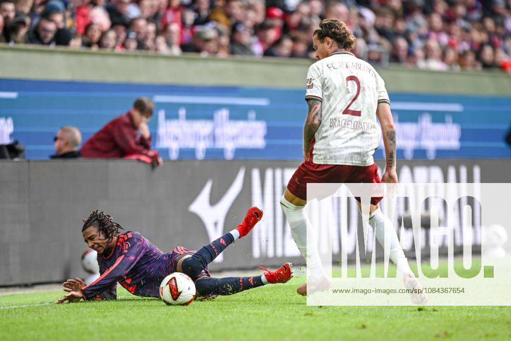 Michael Olise of FC Bayern Munich and Calvin Brackelmann of FC Augsburg battle for the ball during the Bundesliga match between FC Augsburg and FC Bayern Munich, WWK Arena on October 10, 2026, in Augsburg, Germany. Photo by Harry Langer, DeFodi Images. Michael Olise of FC Bayern Munich and Calvin Brackelmann of FC Augsburg battle for the ball during the Bundesliga match between FC Augsburg and FC Bayern Munich at WWK Arena on October 10, 2026 in Augsburg, Germany. Photo by Harry Langer, DeFodi Images. DFB and DFL regulations prohibit any use of photographs as image sequences and or quasi-video. Photo by Harry Langer, DeFodi Images. DFB and DFL regulations prohibit any use of photographs as imSEQUENCES AND OR QUASI-VIDEO