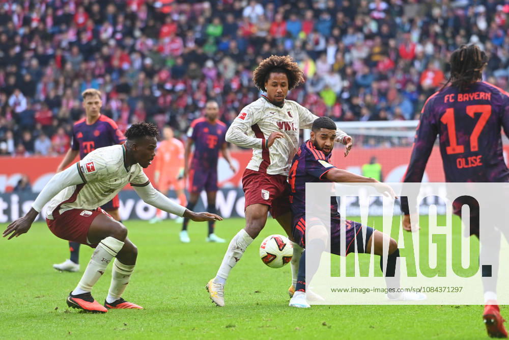 Ismael SAIBARI, Bayern Munich, in action, challenging Han Noah MASENGO of FC Augsburg and Li Juma BAH of FC Augsburg, Soccer, Bundesliga Season 2026–2027, Matchday 5, Matchday 05, FC Augsburg vs. FC Bayern Munich 2–2 on October 10, 2026, WWK Arena