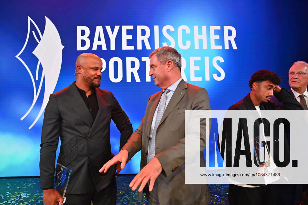 Coach Vincent KOMPANY of Bayern Munich with the Honorary Award from Bavarian Minister-President Markus SOEDER; Nathaniel BROWN of Bayern Munich; Joachim HERRMANN, Bavarian Minister of the Interior; the 2026 Bavarian Sports Award at BMW Welt, Red Carpet on October 10, 2026