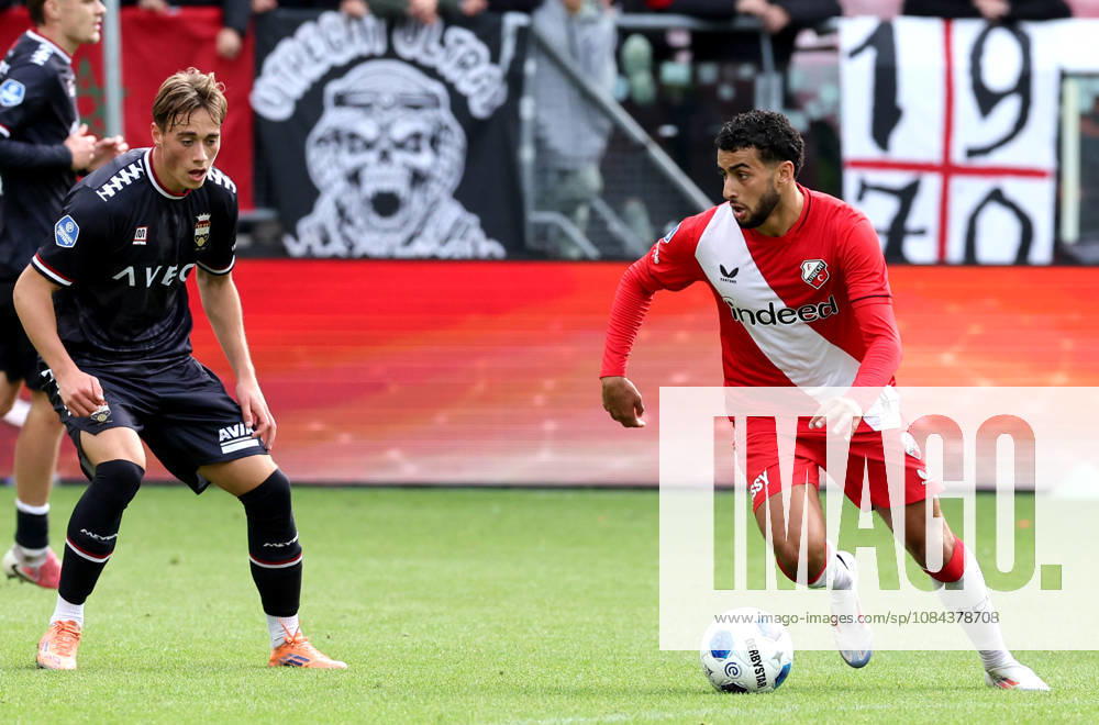 UTRECHT FC Utrecht midfielder Oualid Agougil with Willem II midfielder Uriel van Aalst during the Vriendenloterij Eredivisie match between FC Utrecht and Willem II at Stadion Galgenwaard on October 11, 2026, in Utrecht, the Netherlands PETER LOUS EYE4IMAGES DeFodi Images