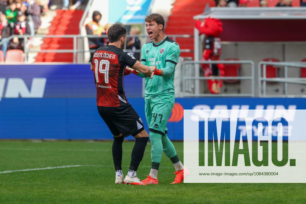 Ingolstadt, Germany, October 11, 2026, 3rd League 2026–2027, Matchday 8: FC Ingolstadt 04 vs. SV Wehen Wiesbaden. Pictured, second from left: FCI goalkeeper David Klein smiling on the field after Wehen missed a penalty kick. DFB and DFL regulations prohibit any use of photographs as image sequences and or quasi-video