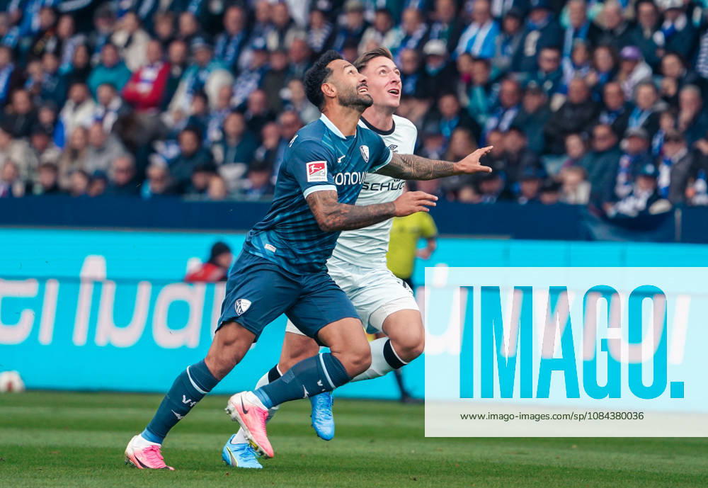 Germany Soccer 2. Bundesliga 2026–2027, Matchday 7: VfL Bochum vs. Arminia Bielefeld at Vonovia Ruhrstadion in Bochum—Marius Wörl (Arminia Bielefeld) and Sean Klaiber (VfL Bochum) in a tackle, 38, 2