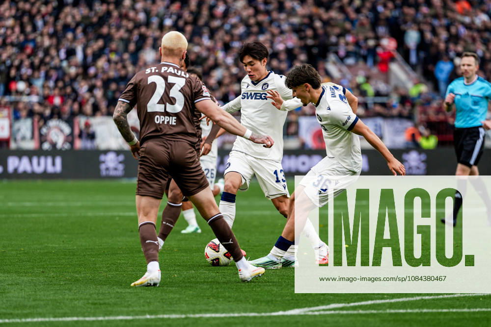 Germany Soccer 2. Bundesliga 2026–27, Matchday 7: FC St. Pauli vs. Karlsruher SC at Millerntor Stadium, Hamburg; St. Pauli: Louis Oppie (FC St. Pauli, 23), Rafael Pinto Pedrosa (Karlsruher SC, 36), Shio Fukuda (Karlsruher SC, 13)