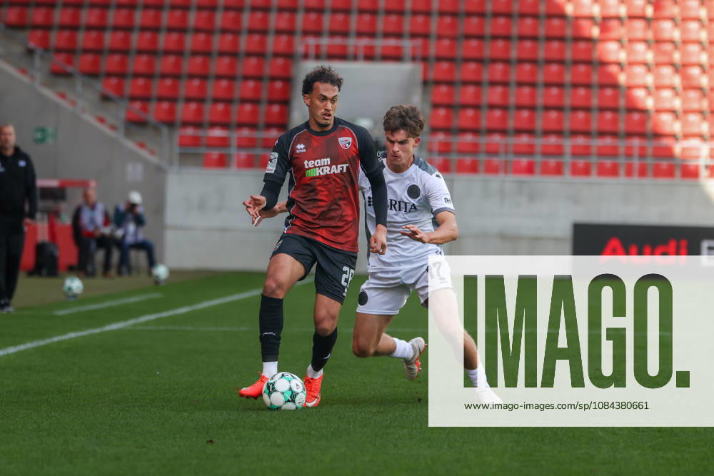 Ingolstadt, Germany, October 11, 2026, 3rd League 2026–2027, Matchday 8: FC Ingolstadt 04 vs. SV Wehen Wiesbaden. Pictured from left, in a tackle: Nishan Velupillay (FCI) and Ben Nink (SVWW). DFB and DFL regulations prohibit any use of photographs as image sequences and or quasi-video