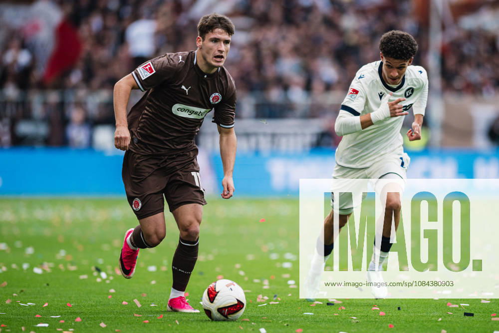 2. Bundesliga: FC St. Pauli vs. Karlsruher SC, October 11, 2026; Arkadiusz Pyrka (FC St. Pauli) vs. Louey Ben Farhat (Karlsruher SC), 19 Soccer, 2. Bundesliga, Matchday 7: FC St. Pauli vs. Karlsruher SC on October 11, 2026, at Millerntor Stadium, Hamburg. DFL regulations prohibit any use of photographs as image sequences and or quasi-video.