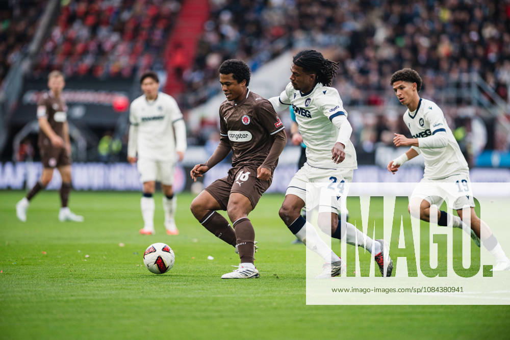 2. Bundesliga: FC St. Pauli vs. Karlsruher SC, October 11, 2026; Joel Fujita (FC St. Pauli, No. 16) vs. Sandro Trémoulet (Karlsruher SC, No. 24); Soccer, 2. Bundesliga, Matchday 7: FC St. Pauli vs. Karlsruher SC on October 11, 2026, at Millerntor Stadium, Hamburg. DFL regulations prohibit any use of photographs as image sequences and or quasi-video.