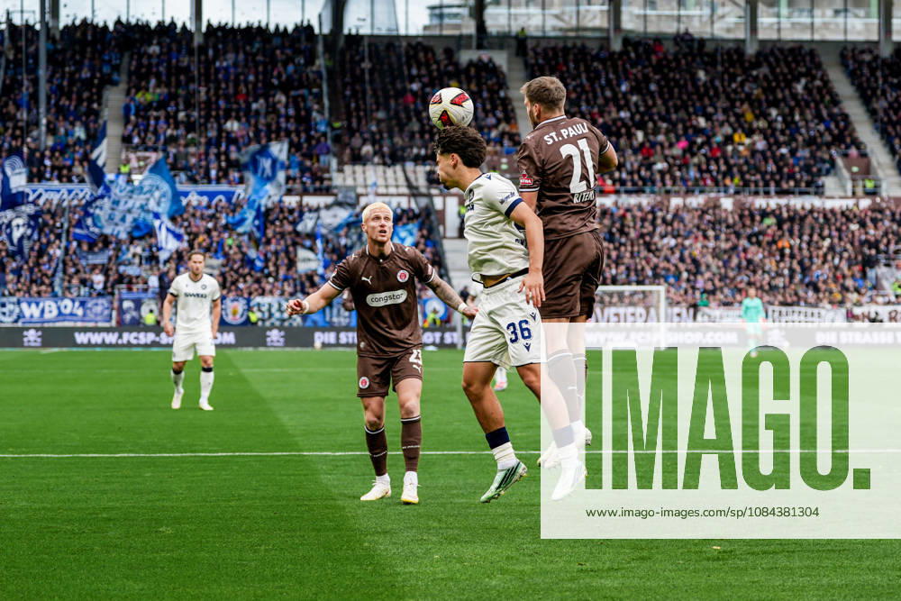 Germany Soccer 2. Bundesliga 2026–27, Matchday 7: FC St. Pauli vs. Karlsruher SC, Millerntor Stadium, Hamburg, St. Pauli: Rafael Pinto Pedrosa (Karlsruher SC, 36), Lars Ritzka (FC St. Pauli, 21), Louis Oppie (FC St. Pauli, 23)