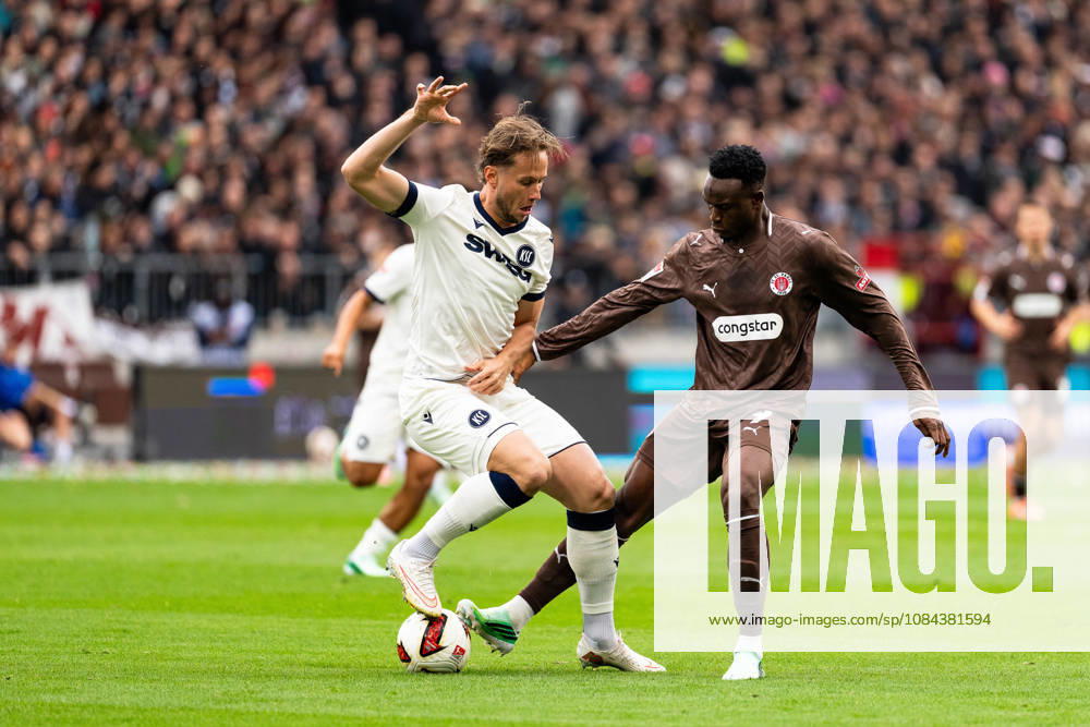 Abdoulie Ceesay (FC St. Pauli, 09) in a tackle with Christoph Kobald (Karlsruher SC, 22), GER, FC St. Pauli vs. Karlsruher SC, Soccer, 2. Bundesliga, Matchday 7, 2026–2027 Season, October 11, 2026 DFL regulations prohibit any use of photographs as image sequences and or quasi-video, GER, FC St. Pauli vs. Karlsruher SC, soccer, 2. Bundesliga, Matchday 7, 2026–2027 season, October 11, 2026, Hamburg