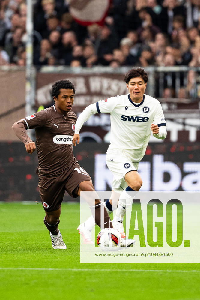 Joel Chima Fujita, FC St. Pauli, No. 16, dribbling; Shio Fukuda, Karlsruher SC, No. 13, GER; FC St. Pauli vs. Karlsruher SC, soccer, 2. Bundesliga, Matchday 7, 2026–2027 season, October 11, 2026 DFL regulations prohibit any use of photographs as image sequences and or quasi-video, GER, FC St. Pauli vs. Karlsruher SC, soccer, 2. Bundesliga, Matchday 7, 2026–2027 season, October 11, 2026, Hamburg