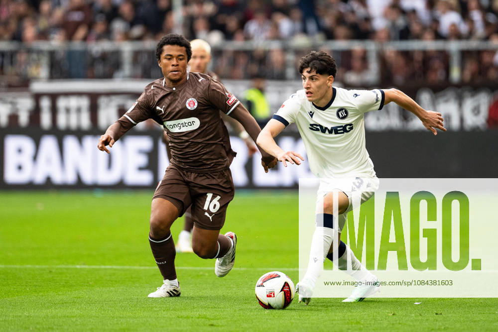 Deniz Ofli, Karlsruher SC, No. 3 dribbling; Joel Chima Fujita, FC St. Pauli, No. 16, GER, FC St. Pauli vs. Karlsruher SC, soccer, 2. Bundesliga, Matchday 7, 2026–2027 season, October 11, 2026 DFL regulations prohibit any use of photographs as image sequences and or quasi-video, GER, FC St. Pauli vs. Karlsruher SC, soccer, 2. Bundesliga, Matchday 7, 2026–2027 season, October 11, 2026, Hamburg