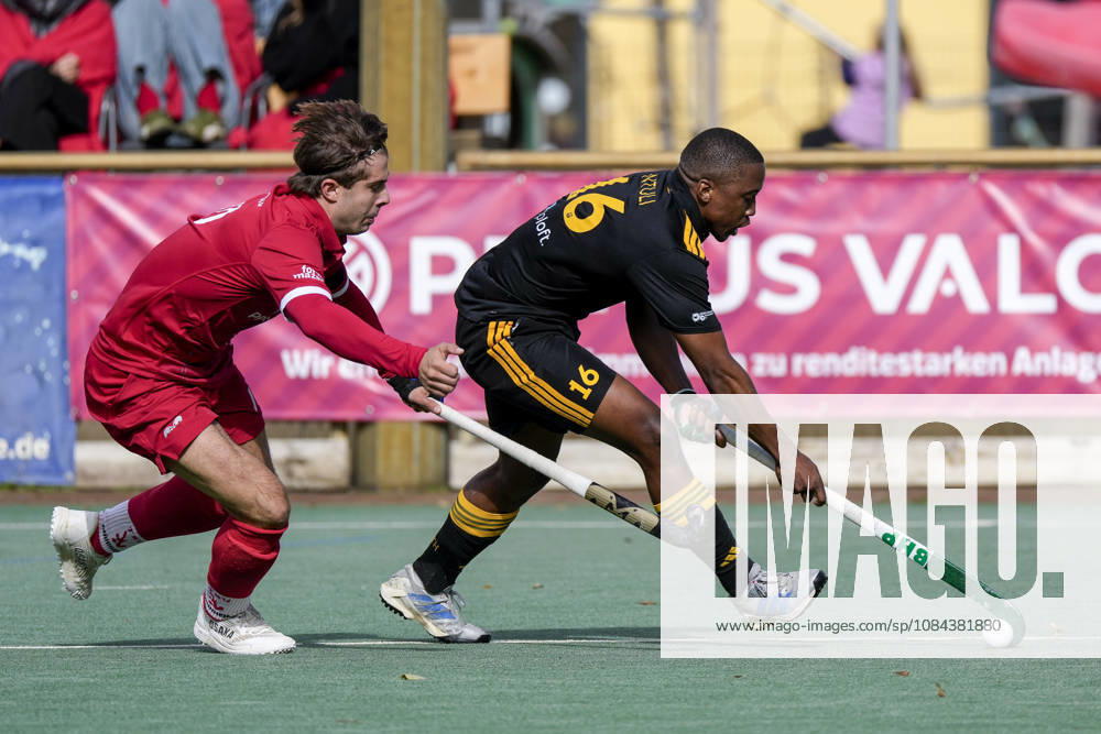 From left: Jonas Wossidlo (TSVMH), 10, Nqobile Mansuet Ntuli Bili (HTHC), 16, tackle, game play, duel, tackle, tackling, dynamic, action, 11 10 2026, Mannheim, Germany, hockey, 1st Bundesliga, men’s, TSV Mannheim Harvestehuder THC