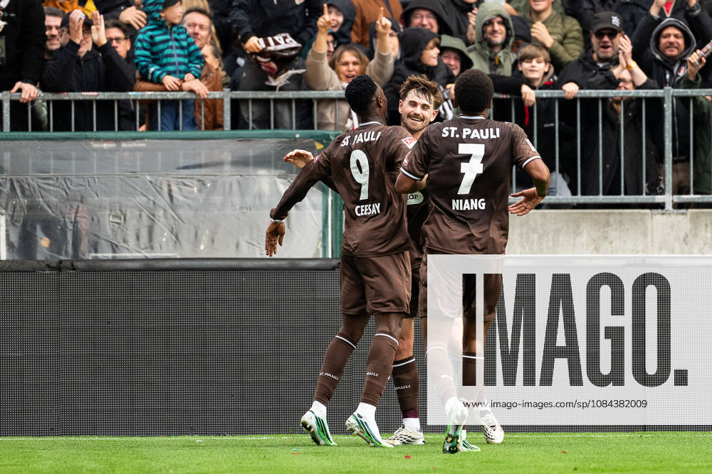 Goal to make it 1–0: Abdoulie Ceesay (FC St. Pauli, 09) celebrates with Connor Metcalfe (FC St. Pauli, 24) and Youssoupha Niang (FC St. Pauli, 07, GER, FC St. Pauli vs. Karlsruher SC, soccer, 2. Bundesliga, Matchday 7, 2026–2027 season, October 11, 2026 DFL regulations prohibit any use of photographs as image sequences and or quasi-video GER, FC St. Pauli vs. Karlsruher SC, soccer, 2. Bundesliga, Matchday 7, 2026–2027 season, October 11, 2026, Hamburg