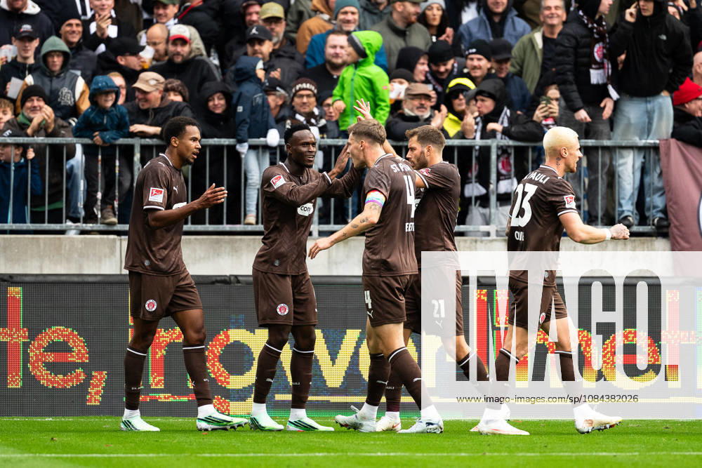 Goal to make it 1–0: Abdoulie Ceesay (FC St. Pauli, 09) celebrates with Youssoupha Niang (FC St. Pauli, 07) and David Nemeth (FC St. Pauli, 04, Lars Ritzka (FC St. Pauli, 21), and Louis Oppie (FC St. Pauli, 23), GER, FC St. Pauli vs. Karlsruher SC, soccer, 2. Bundesliga, Matchday 7, 2026–2027 season, October 11, 2026 DFL regulations prohibit any use of photographs as image sequences and or quasi-video GER, FC St. Pauli vs. Karlsruher SC, soccer, 2. Bundesliga, Matchday 7, 2026–2027 season, October 11, 2026, Hamburg